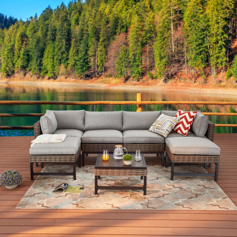 Latitude Run® 7 Piece Rattan Sectional Seating Group with Cushions